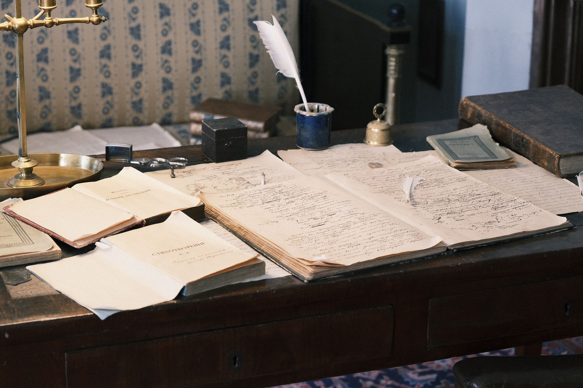 an open old book with handwriting in the margin
